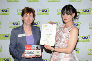 Mary Thomas receiving the Gold Scoot Headline award for training and education at the Scoot awards in April 2016.